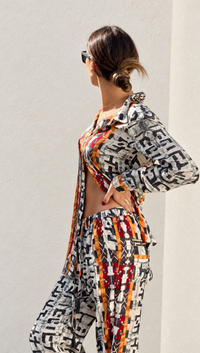 Thumbnail for Conjunto de blusa y pantalón estampado geométrico africa