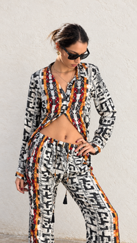 Thumbnail for Conjunto de blusa y pantalón estampado geométrico africa